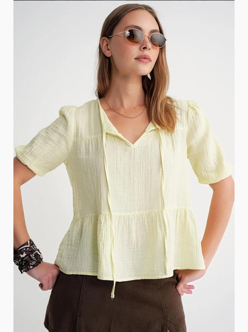 Blusa de muselina texturizada con cuello redondo y ribete mixray Amarillo limón - Kiabi