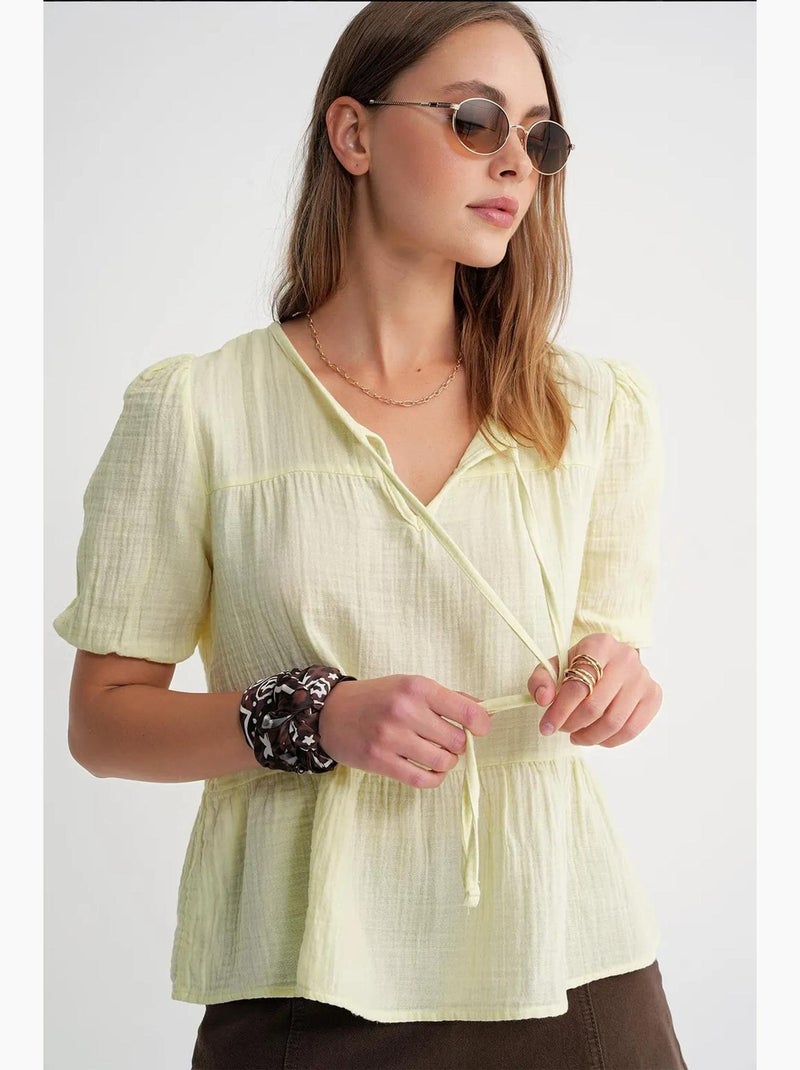 Blusa de muselina texturizada con cuello redondo y ribete mixray Amarillo limón - Kiabi