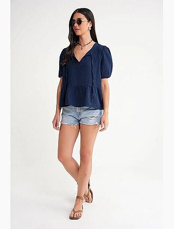 Blusa de muselina texturizada con cuello redondo y ribete mixray