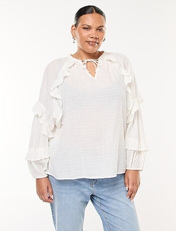 Blusa de plumeti con volantes y lazos para anudar al cuello