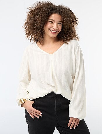 Blusa de punto calado con manga corta