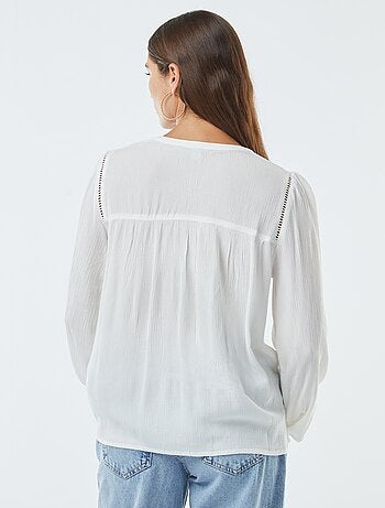 Blusa de punto de crepé con borde calado