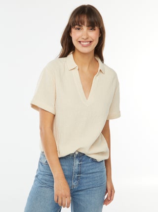 Blusa de punto de crepé con cuello de polo