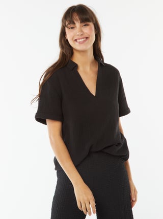 Blusa de punto de crepé con cuello de polo