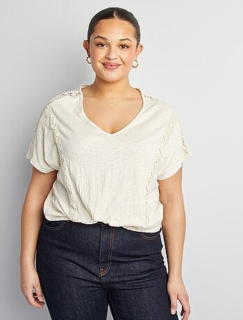 Blusa de tejido de crepé con bordados