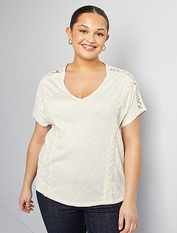 Blusa de tejido de crepé con bordados