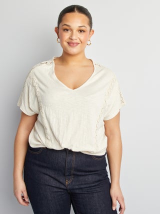 Blusa de tejido de crepé con bordados