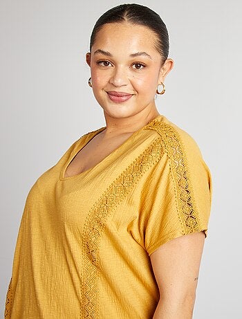 Blusa de tejido de crepé con bordados