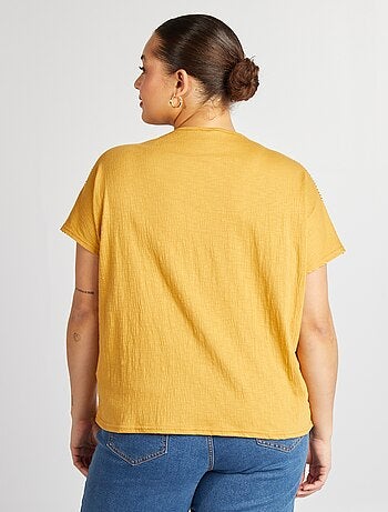 Blusa de tejido de crepé con bordados