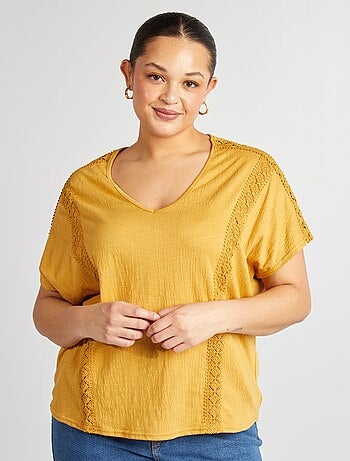 Blusa de tejido de crepé con bordados