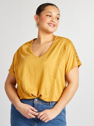 Blusa de tejido de crepé con bordados