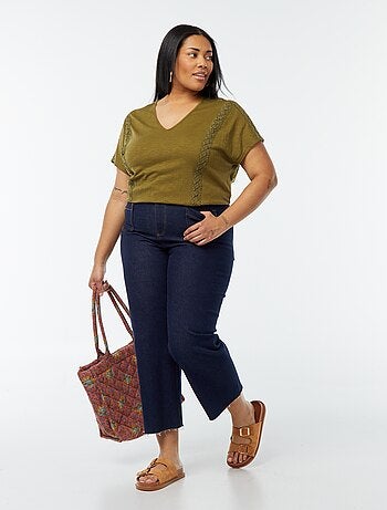 Blusa de tejido de crepé con bordados
