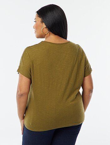 Blusa de tejido de crepé con bordados