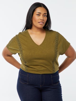 Blusa de tejido de crepé con bordados