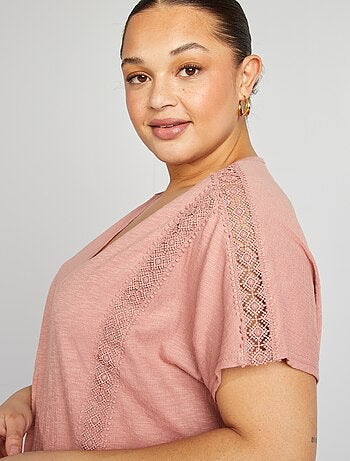Blusa de tejido de crepé con bordados
