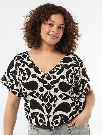 Blusa de tejido gofrado con manga corta