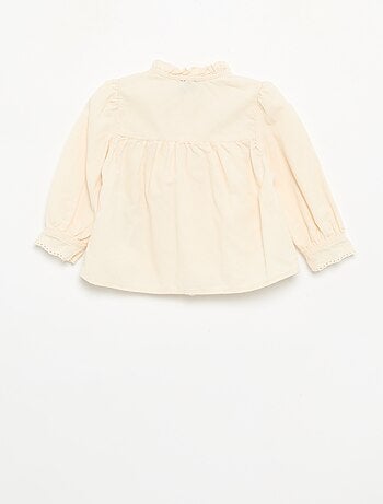 Blusa de terciopelo con puños bordados