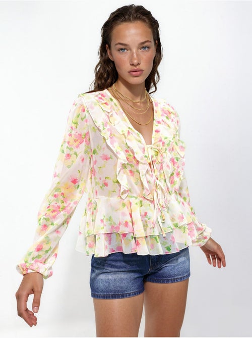 Blusa estampada con cuello en V y volantes - Kiabi Blusa estampada con cuello en V y volantes - Kiabi
