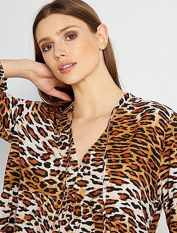 leopardo mujer