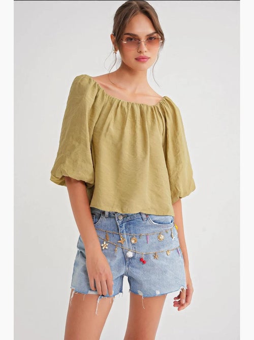 Blusa fina de modal y poliéster con cuello madonna y detalle de volante mixray - Kiabi Blusa fina de modal y poliéster con cuello madonna y detalle de volante mixray - Kiabi
