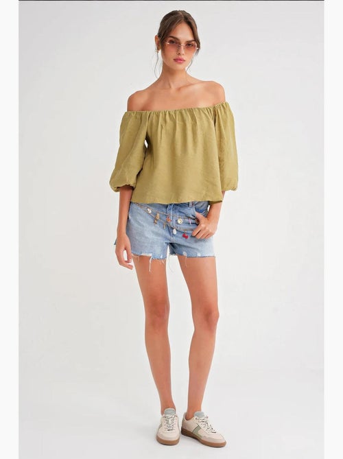 Blusa fina de modal y poliéster con cuello madonna y detalle de volante mixray - Kiabi Blusa fina de modal y poliéster con cuello madonna y detalle de volante mixray - Kiabi