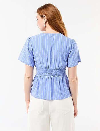 Blusa fluida de corte acampanado
