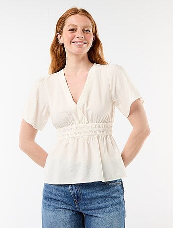 Blusa fluida de corte acampanado