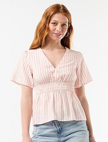 Blusa fluida de corte acampanado