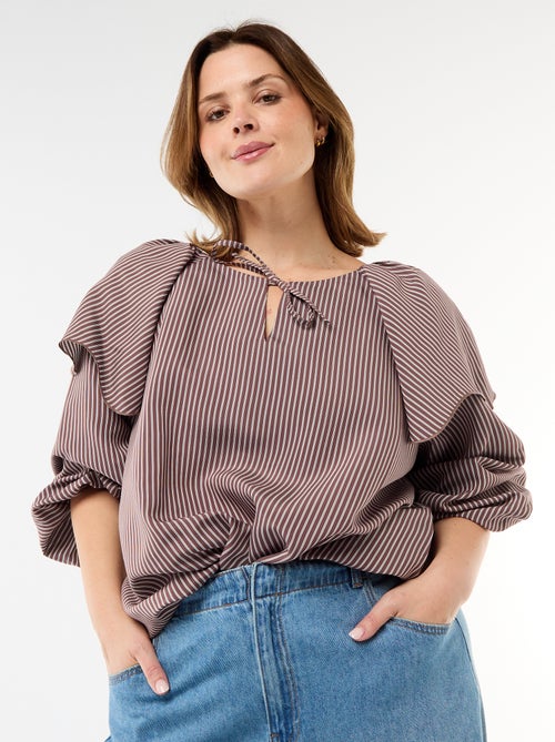 Blusa fluida de manga larga con volante grande en el cuello - Kiabi Blusa fluida de manga larga con volante grande en el cuello - Kiabi