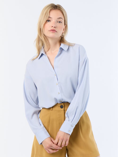 Blusa fluida lisa - Kiabi Blusa fluida lisa - Kiabi