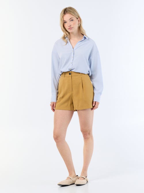 Blusa fluida lisa - Kiabi Blusa fluida lisa - Kiabi