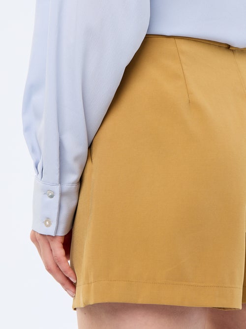 Blusa fluida lisa - Kiabi Blusa fluida lisa - Kiabi