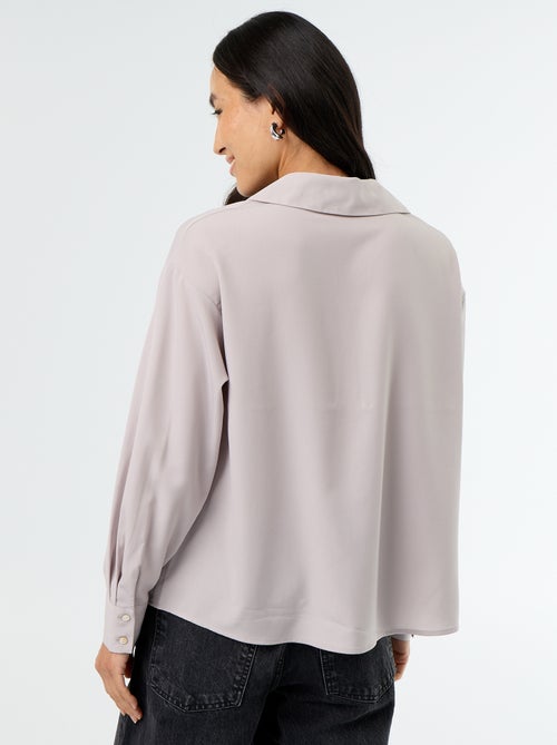 Blusa fluida lisa - Kiabi Blusa fluida lisa - Kiabi