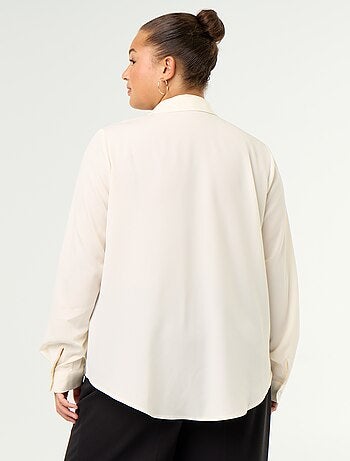 Blusa fluida lisa