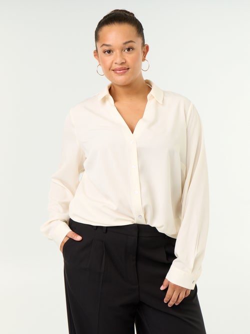Blusa fluida lisa - Kiabi Blusa fluida lisa - Kiabi