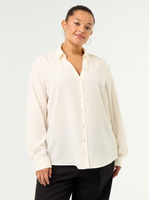 Blusa fluida lisa - Kiabi Blusa fluida lisa - Kiabi