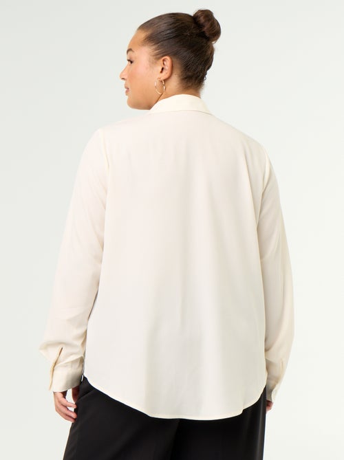 Blusa fluida lisa - Kiabi Blusa fluida lisa - Kiabi