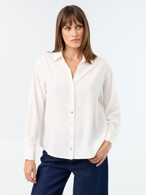Blusa fluida lisa - Kiabi Blusa fluida lisa - Kiabi