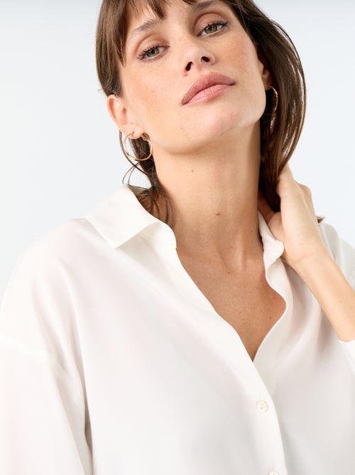 Blusa fluida lisa - Kiabi Blusa fluida lisa - Kiabi