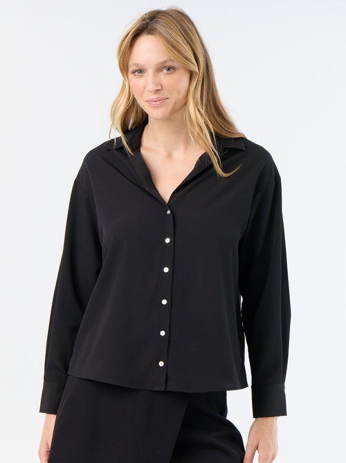 Blusa fluida lisa - Kiabi Blusa fluida lisa - Kiabi