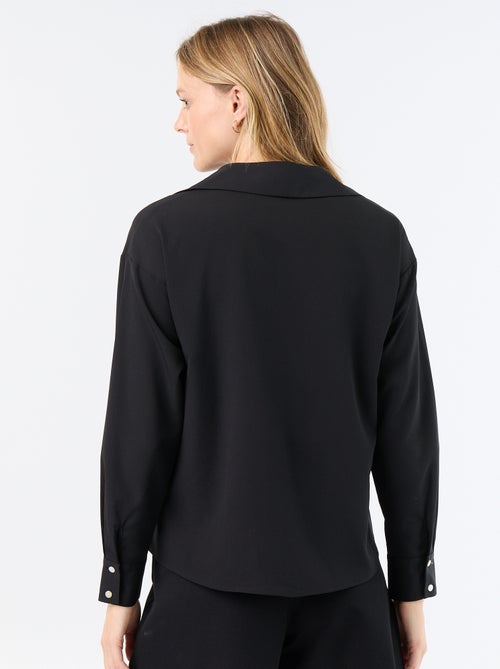 Blusa fluida lisa - Kiabi Blusa fluida lisa - Kiabi