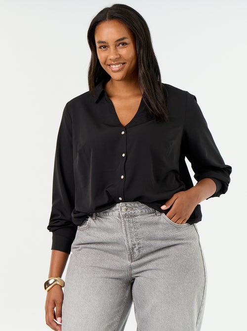 Blusa fluida lisa - Kiabi Blusa fluida lisa - Kiabi