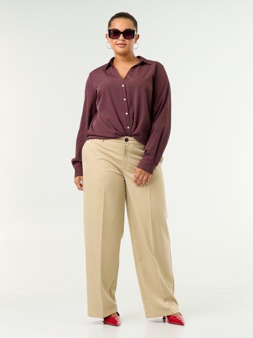 Blusa fluida lisa - Kiabi Blusa fluida lisa - Kiabi