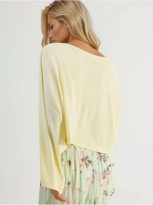 Blusa holgada con cuello barco busem - Kiabi Blusa holgada con cuello barco busem - Kiabi
