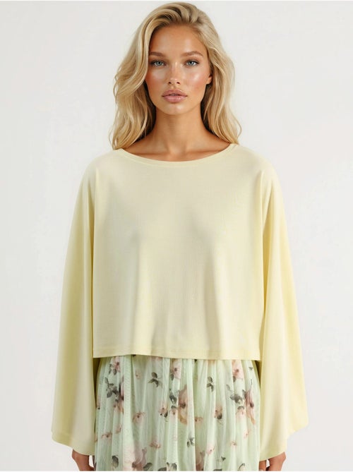 Blusa holgada con cuello barco busem - Kiabi Blusa holgada con cuello barco busem - Kiabi