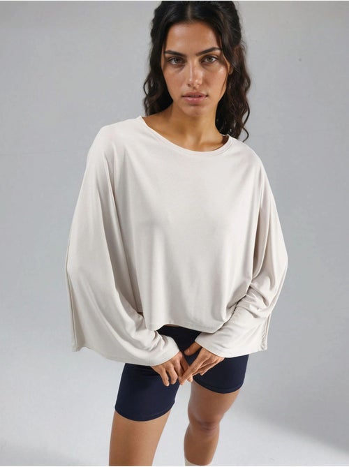 Blusa holgada con cuello barco busem - Kiabi Blusa holgada con cuello barco busem - Kiabi
