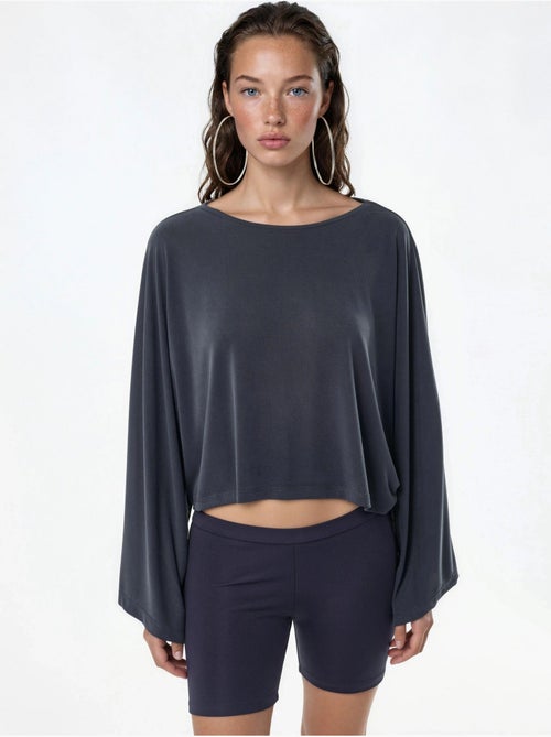 Blusa holgada con cuello barco busem - Kiabi Blusa holgada con cuello barco busem - Kiabi