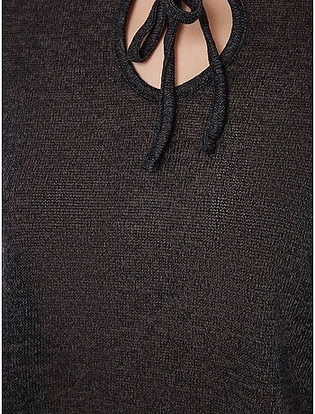 Blusa holgada de punto con cuello redondo y detalle de lazo