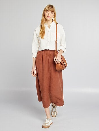 Blusa larga con bolsillo en el pecho con un 20 % de lino