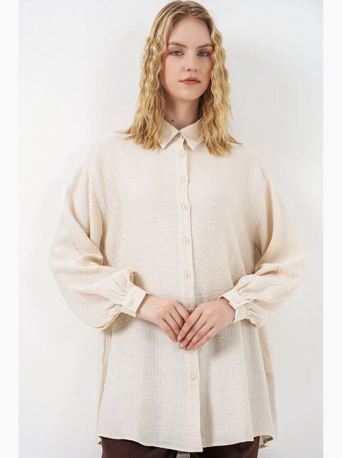Blusa larga oversize texturizada con cuello de camisa bdart - Kiabi Blusa larga oversize texturizada con cuello de camisa bdart - Kiabi
